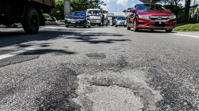 jalan raya rosak